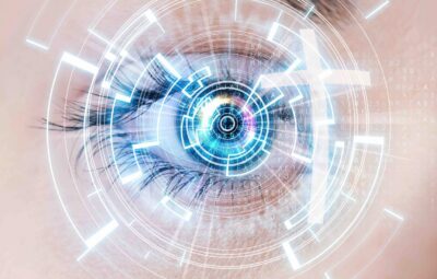 Close up of eye with digital lights and Christian cross